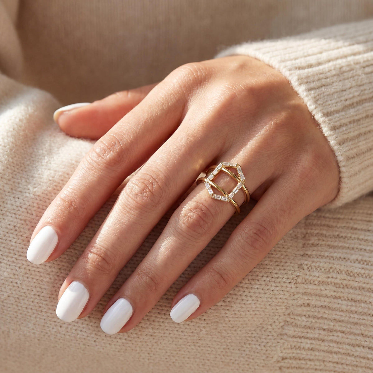 14K gold geometric baguette cz criss cross ring, styled view