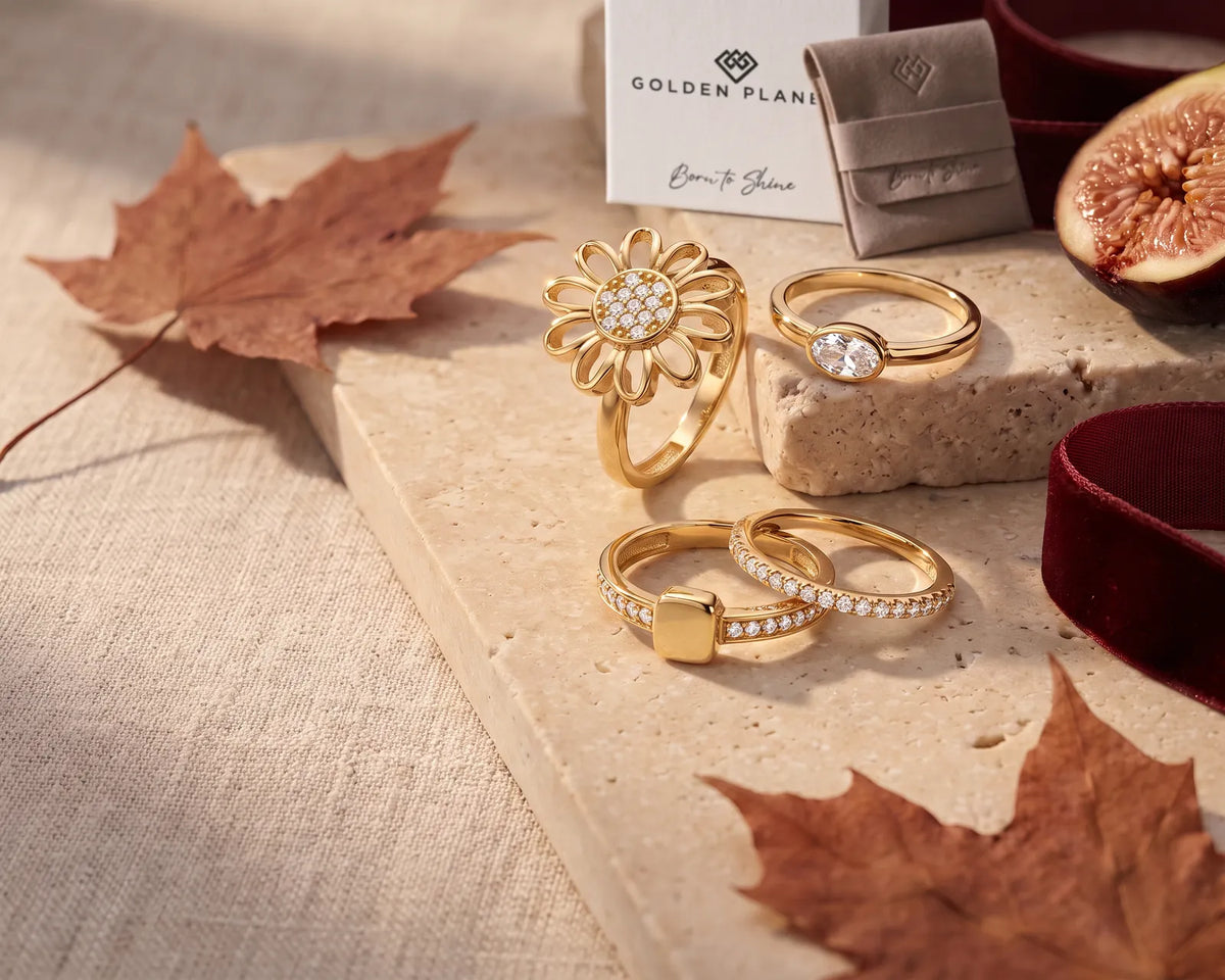 14K gold daisy ring, oval cubic zirconia ring, signet ring and half eternity ring with Golden Planet gift box and pouch