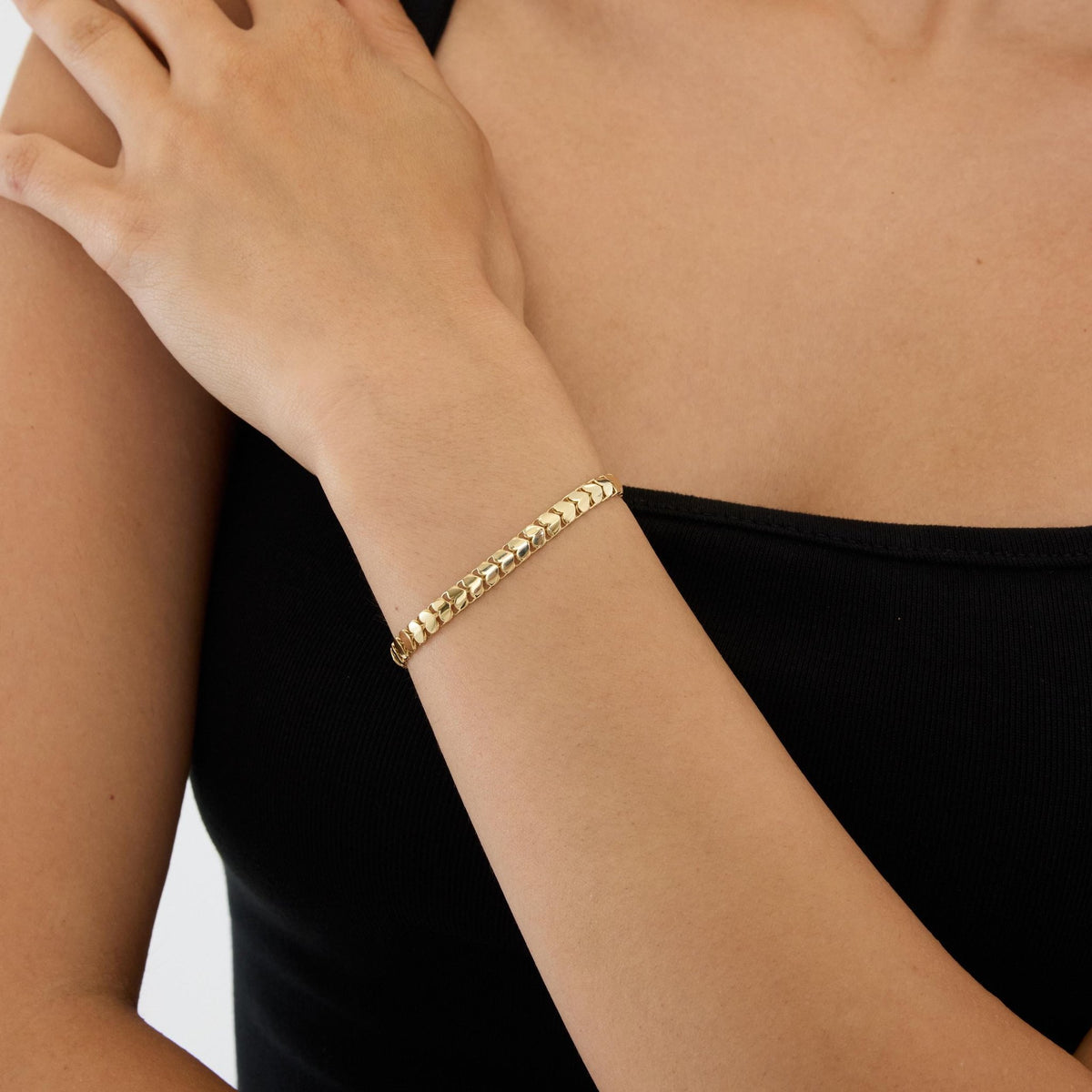 14K gold heart link bracelet, styled view