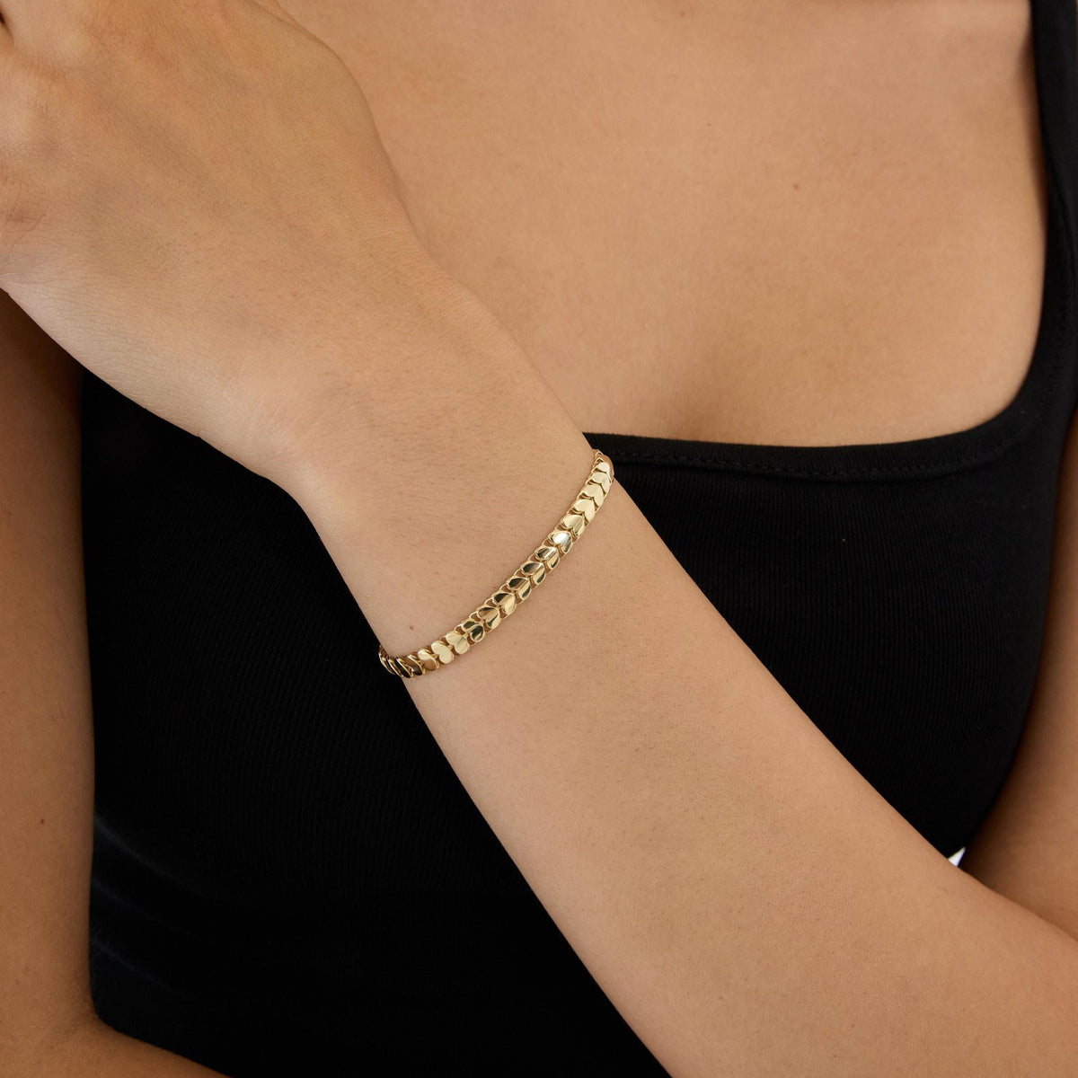 14K gold heart link bracelet, styled view