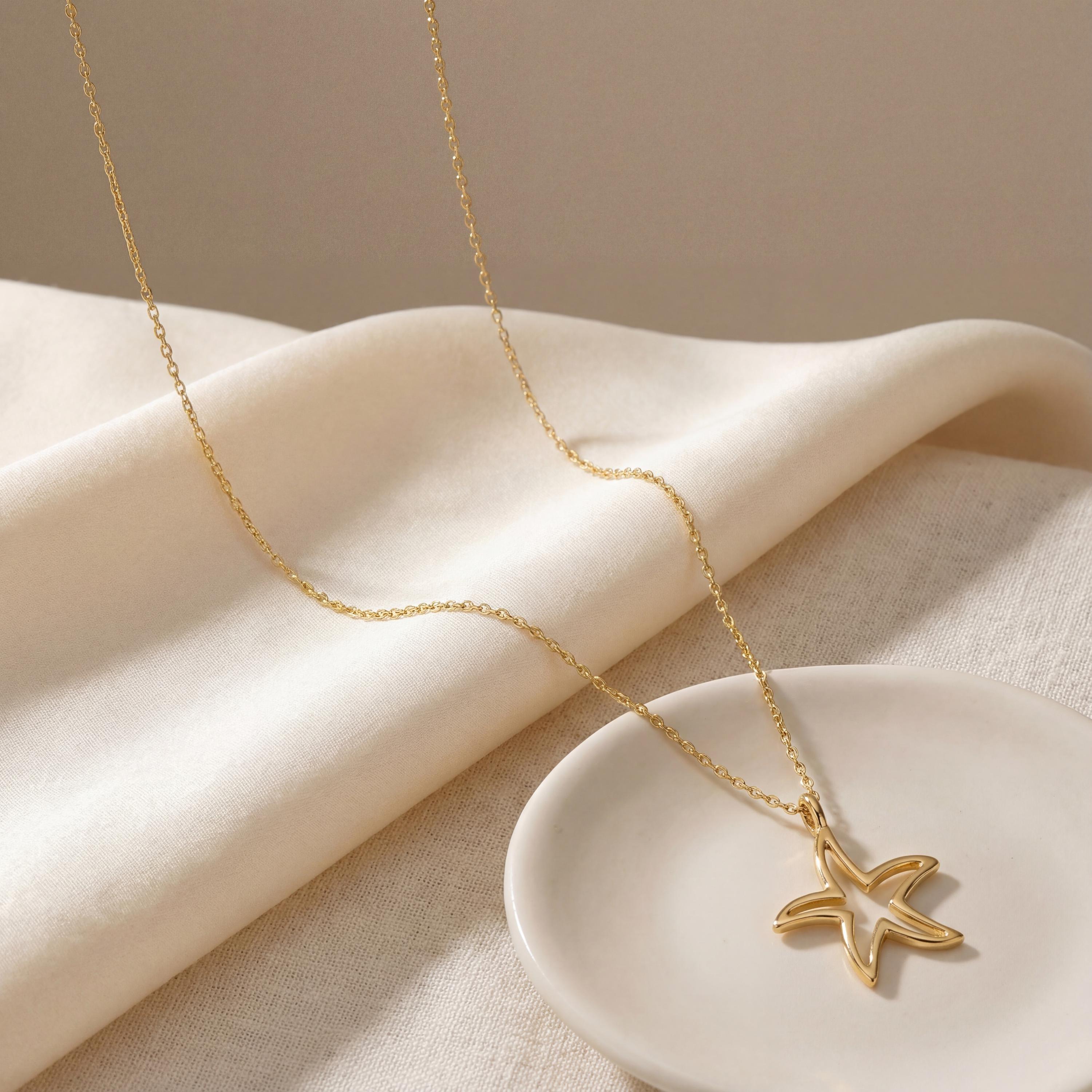 14K solid gold starfish necklace worn