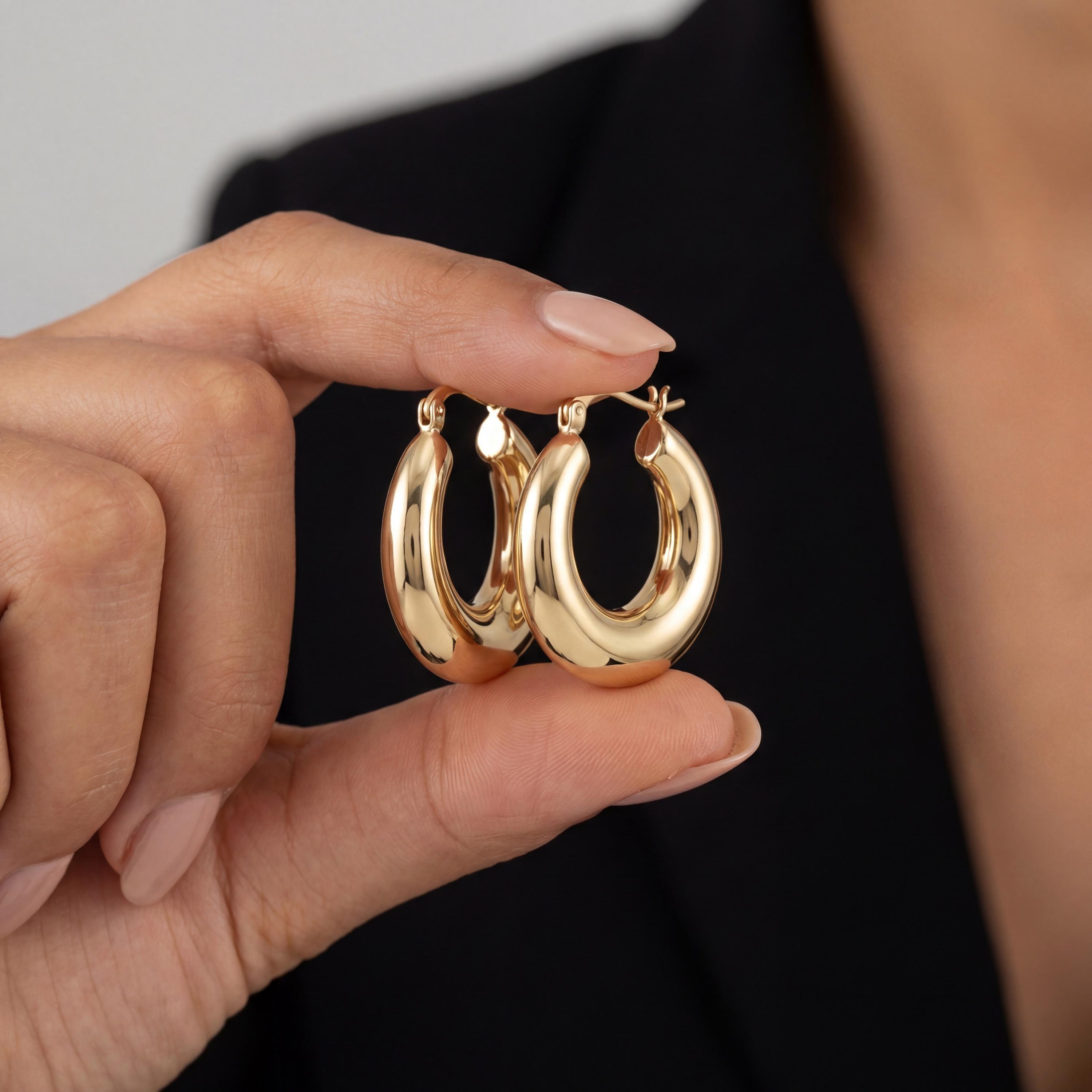 14K solid gold thick hoop earrings worn