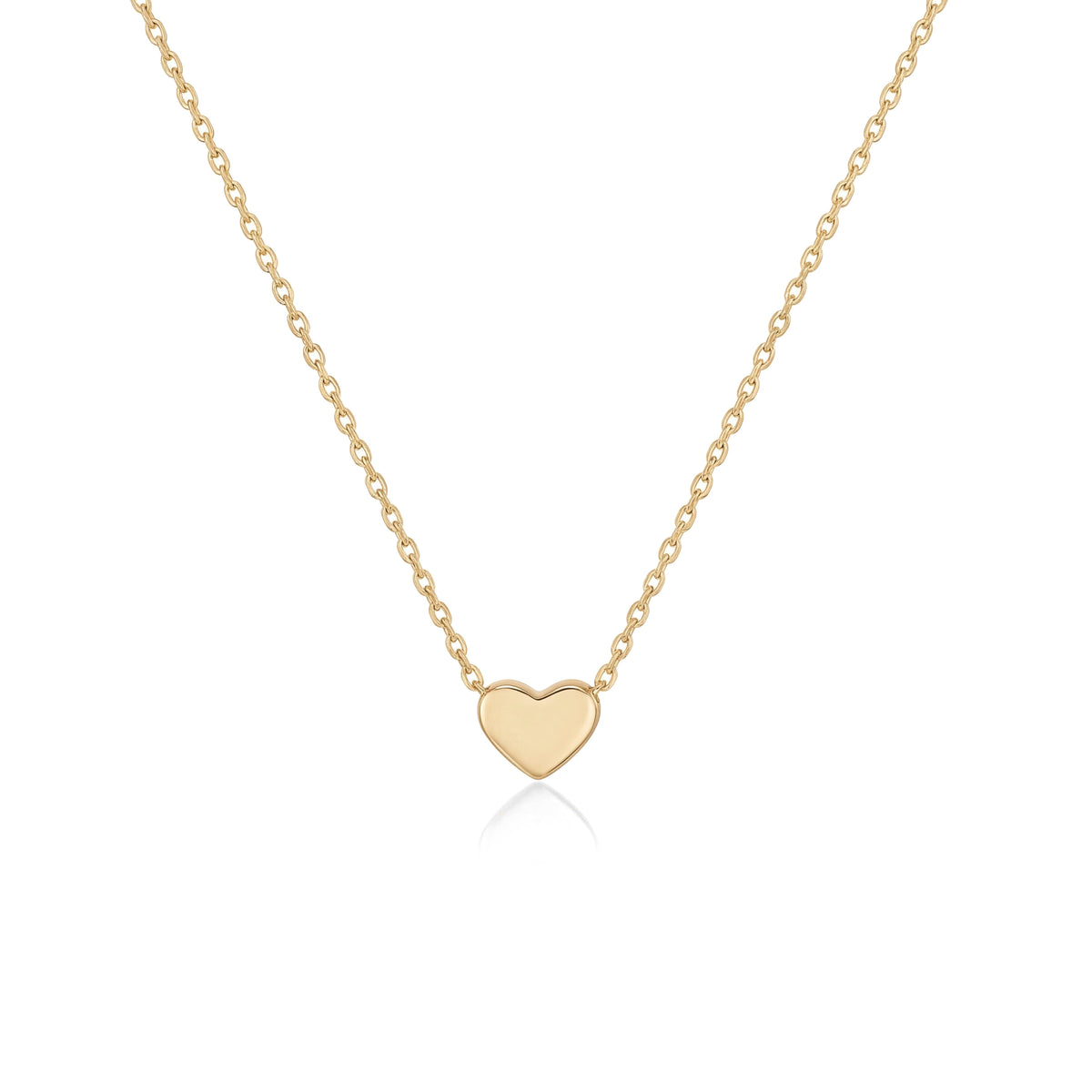 14K yellow gold heart necklace, tiny polished heart fixed on a fine cable chain, close-up on white
