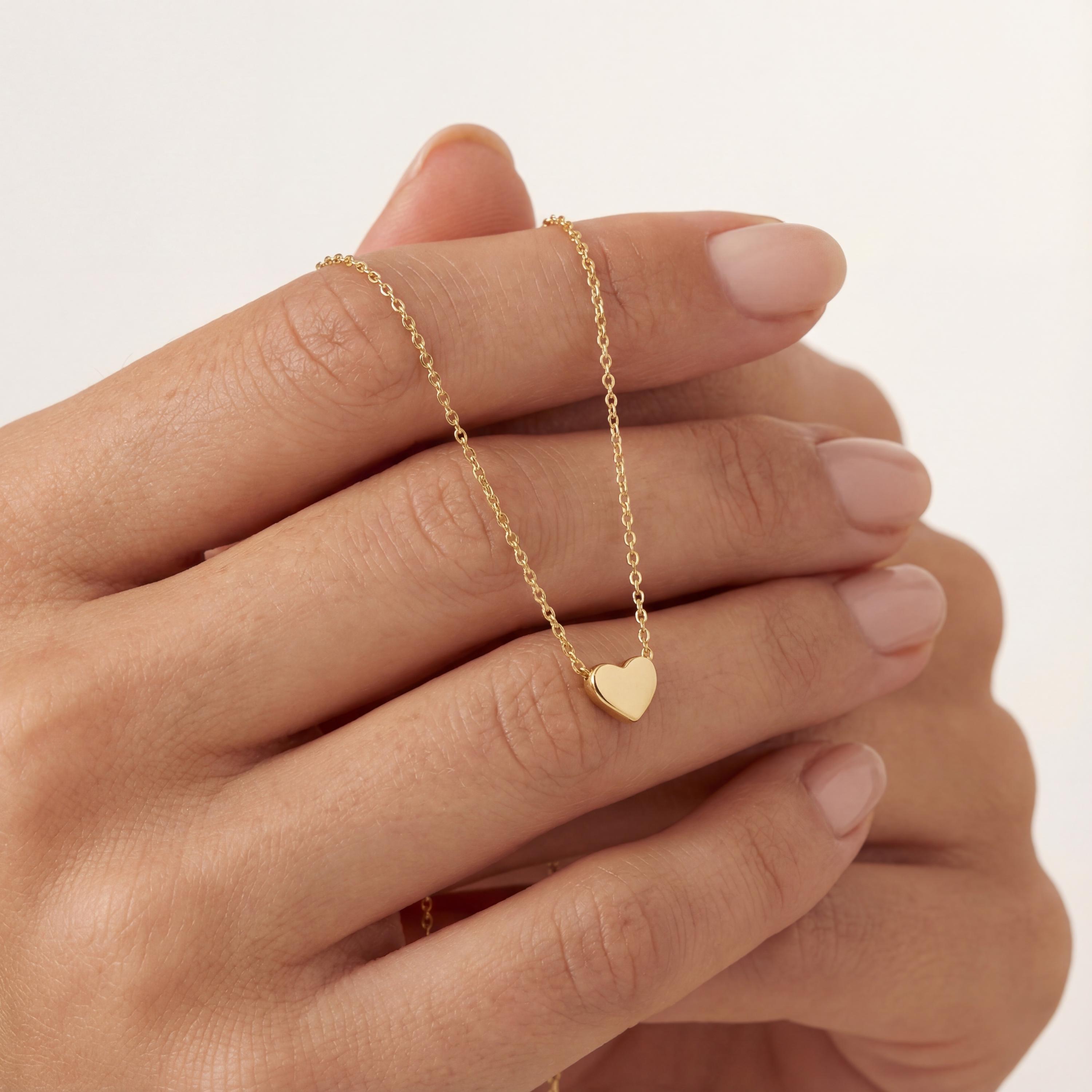 14K solid gold heart necklace worn
