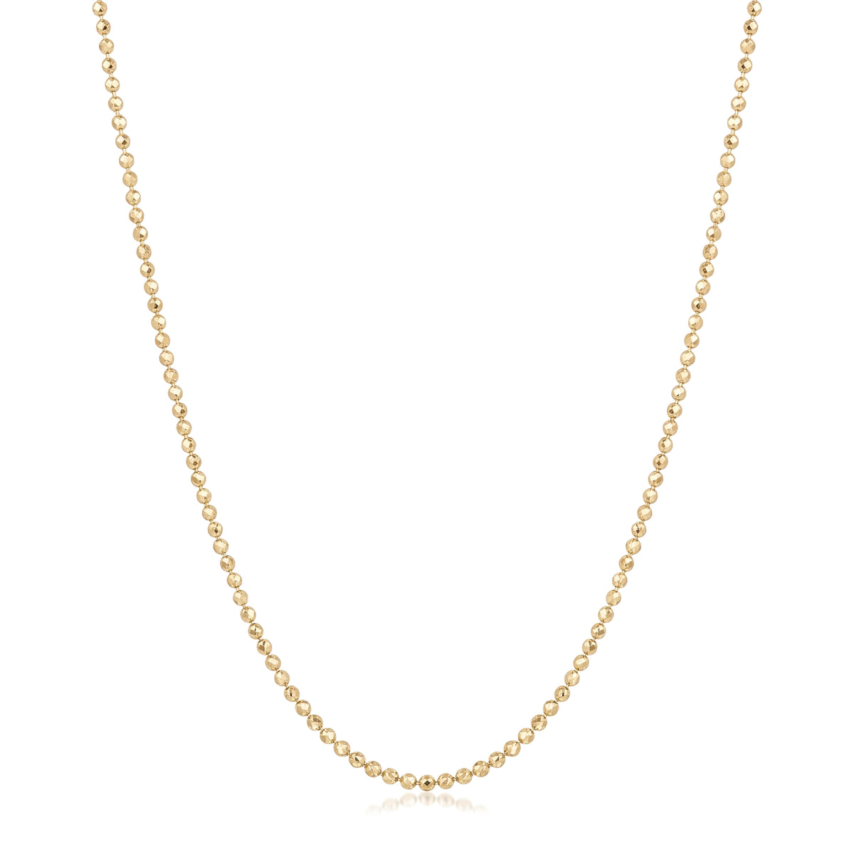 14K yellow gold ball chain necklace with tiny faceted beads, draped in a U shape on white