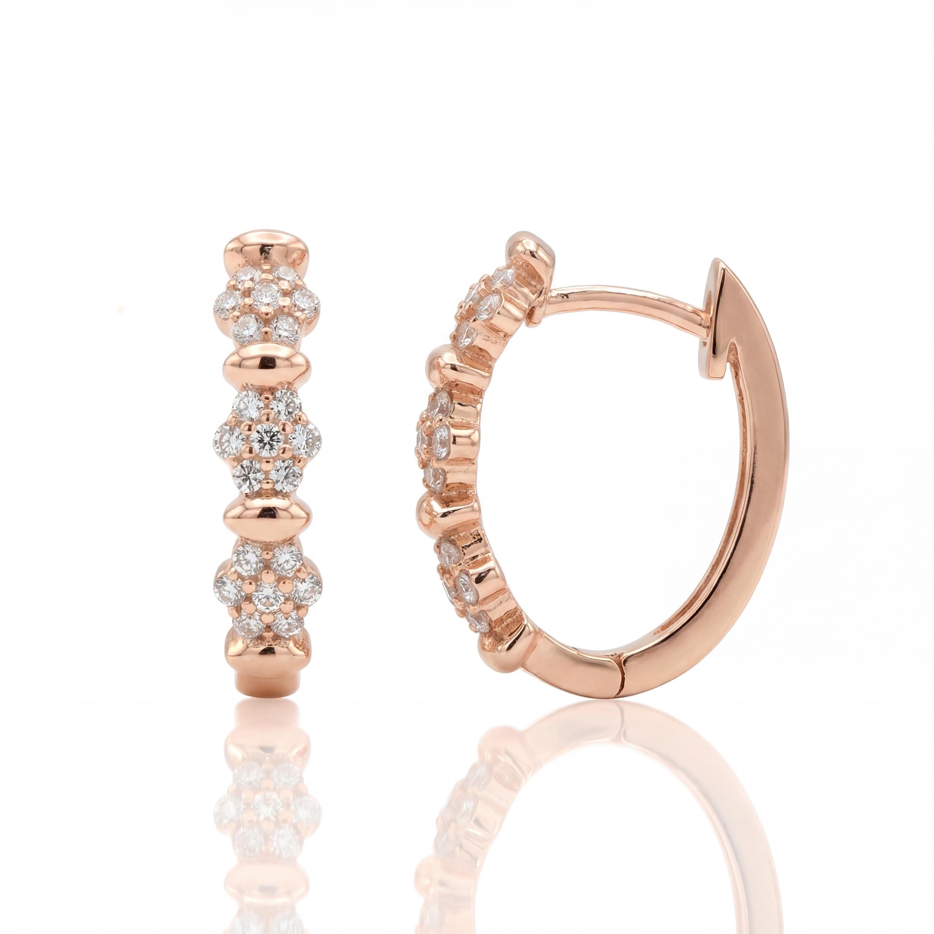 14K solid gold pavé hoop earrings, styled view