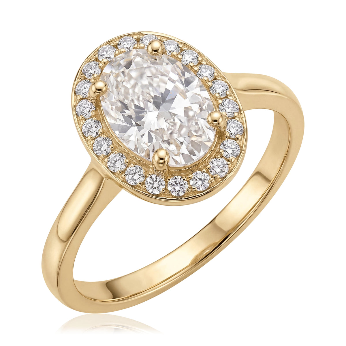 14K yellow gold oval halo ring, prong-set oval cubic zirconia framed by small round stones