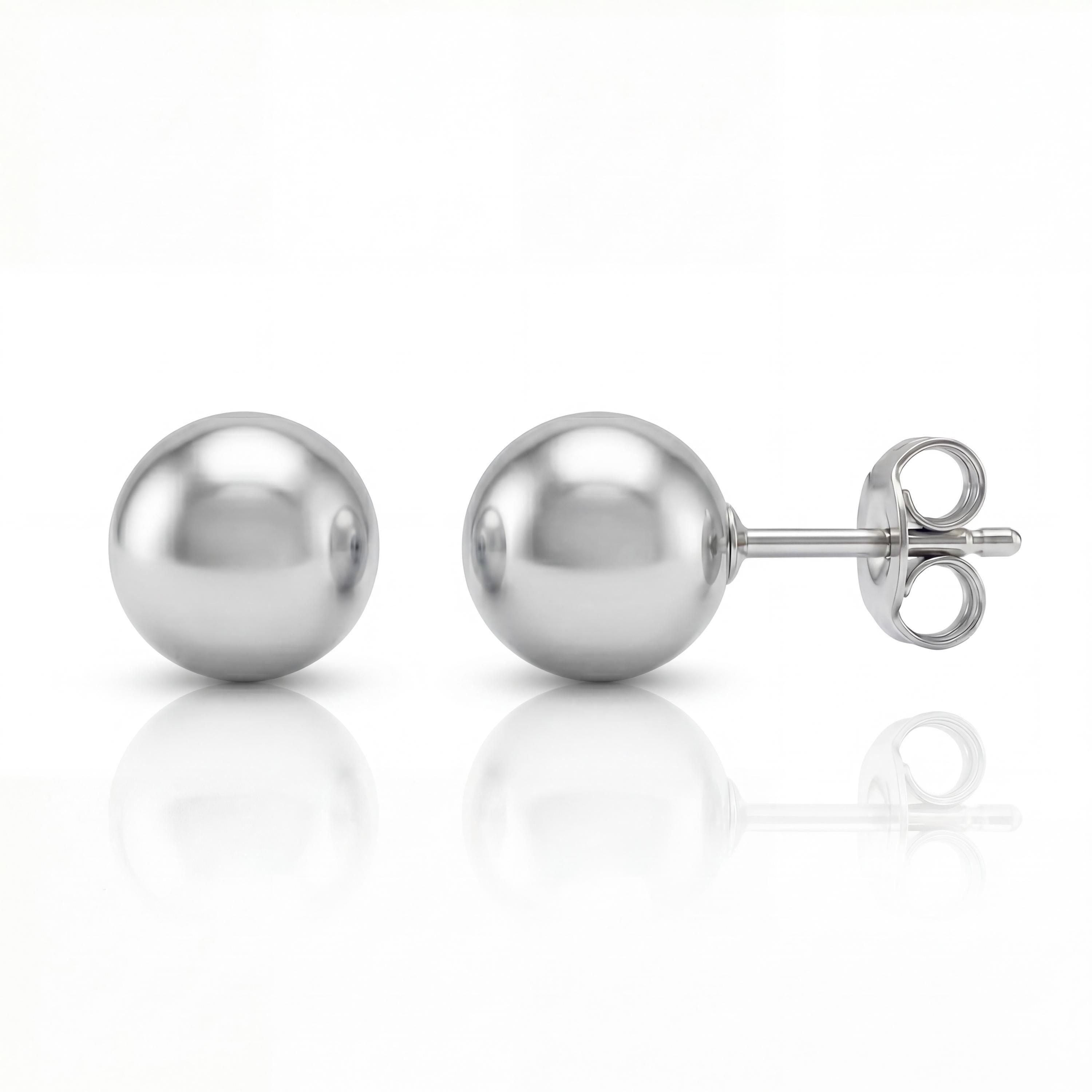 14K solid gold ball stud earrings, styled view