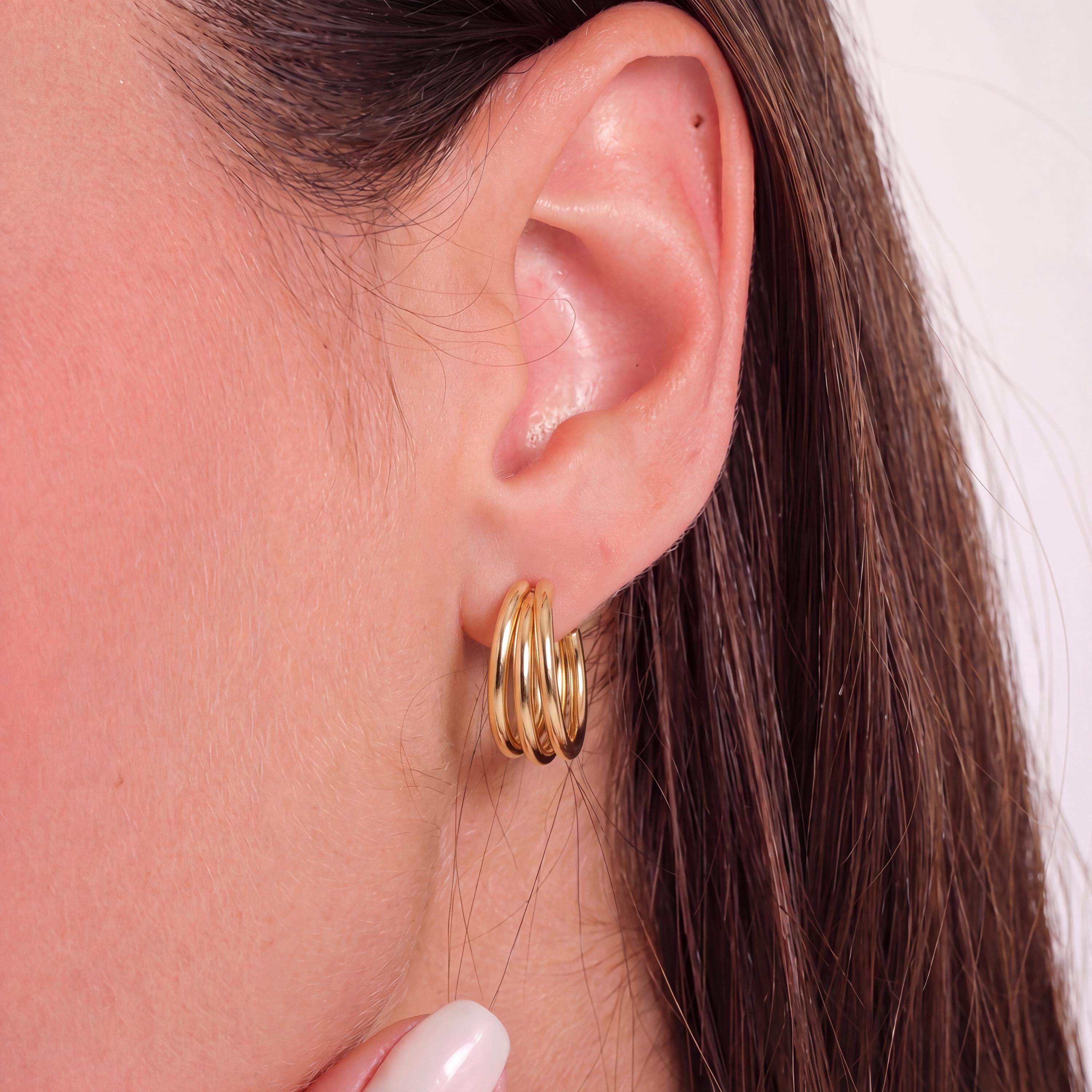 14K gold triple hoop earrings worn