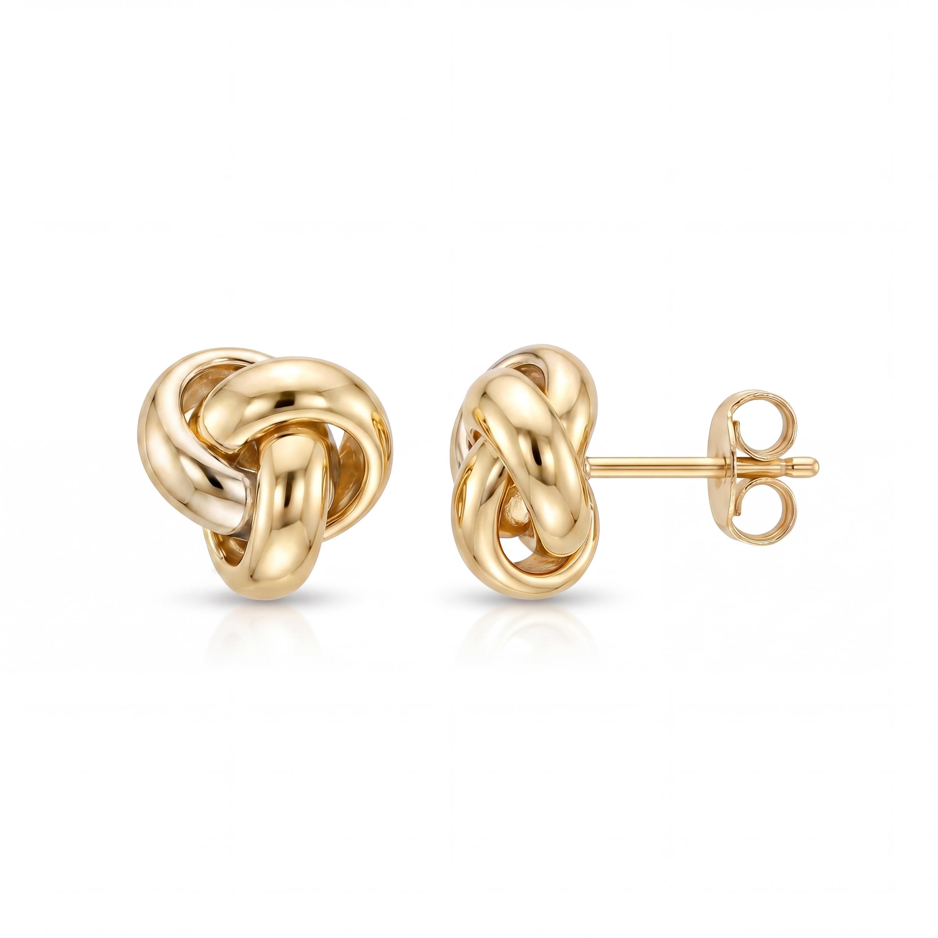 14K solid gold two tone knot stud earrings, styled view