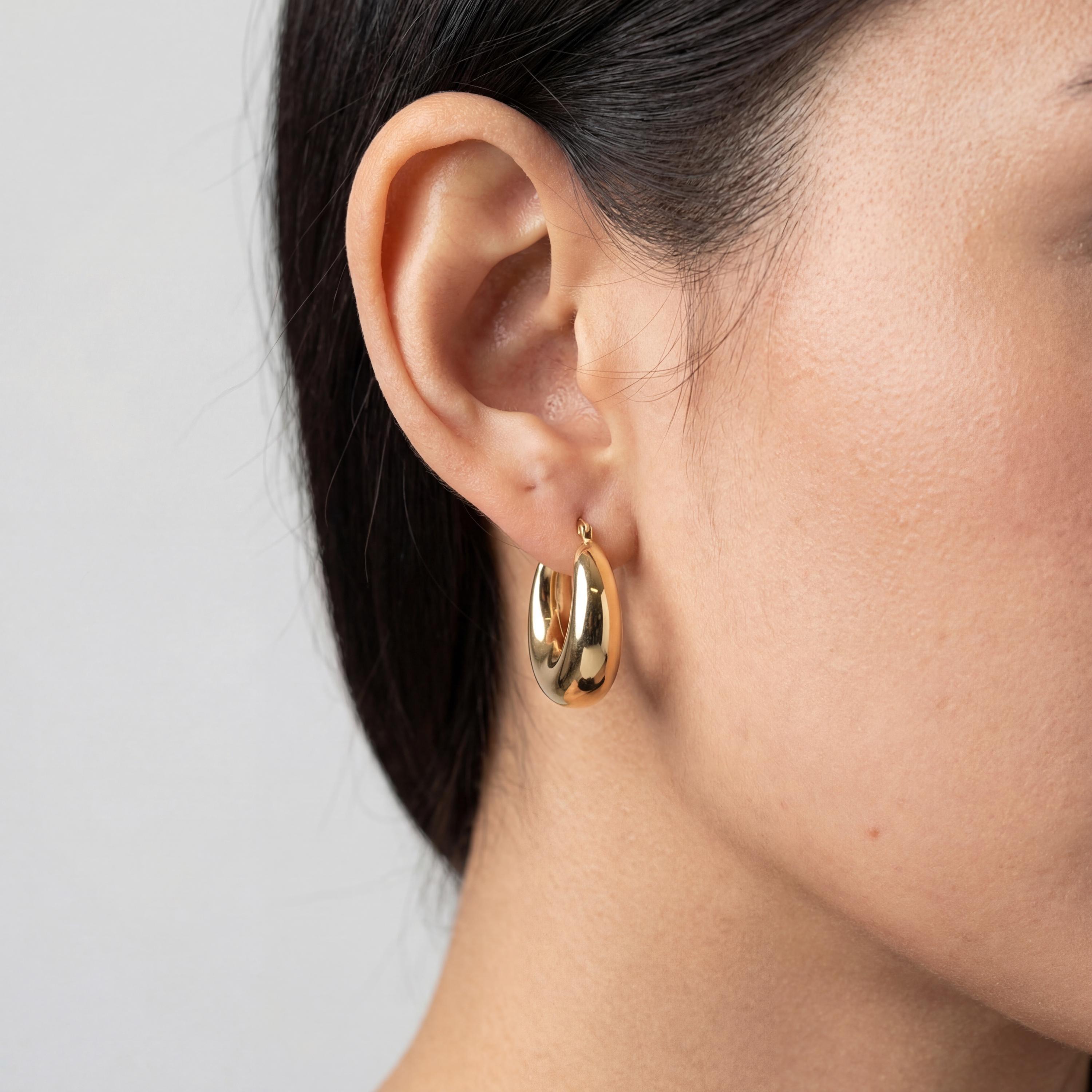 14K solid gold chunky hoop earrings worn
