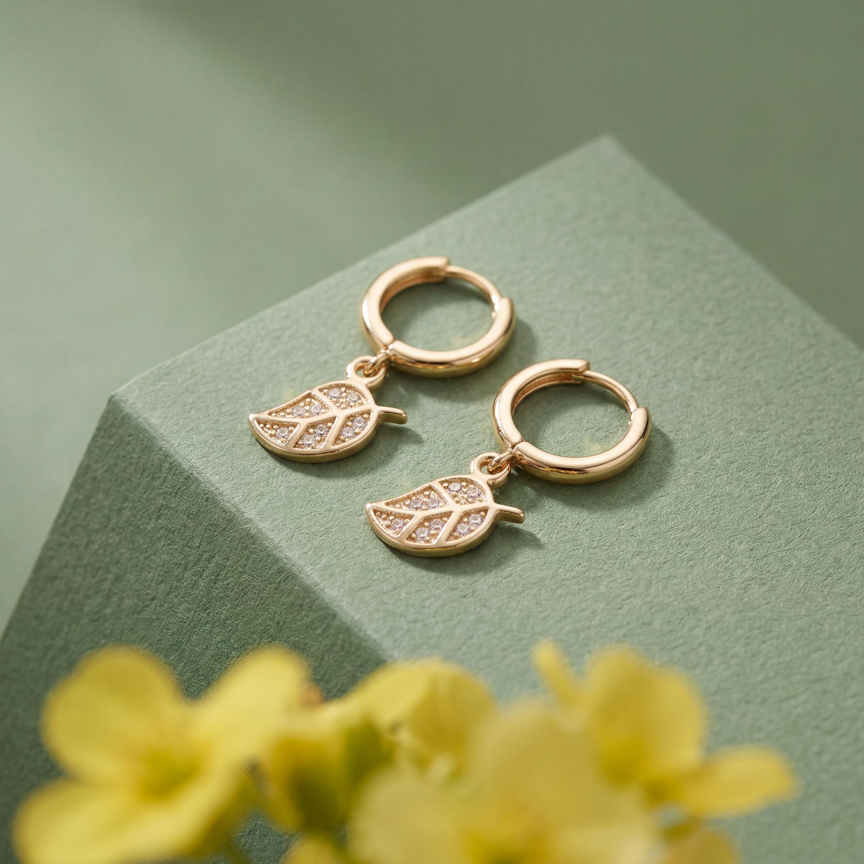 14K gold leaf hoop earrings worn