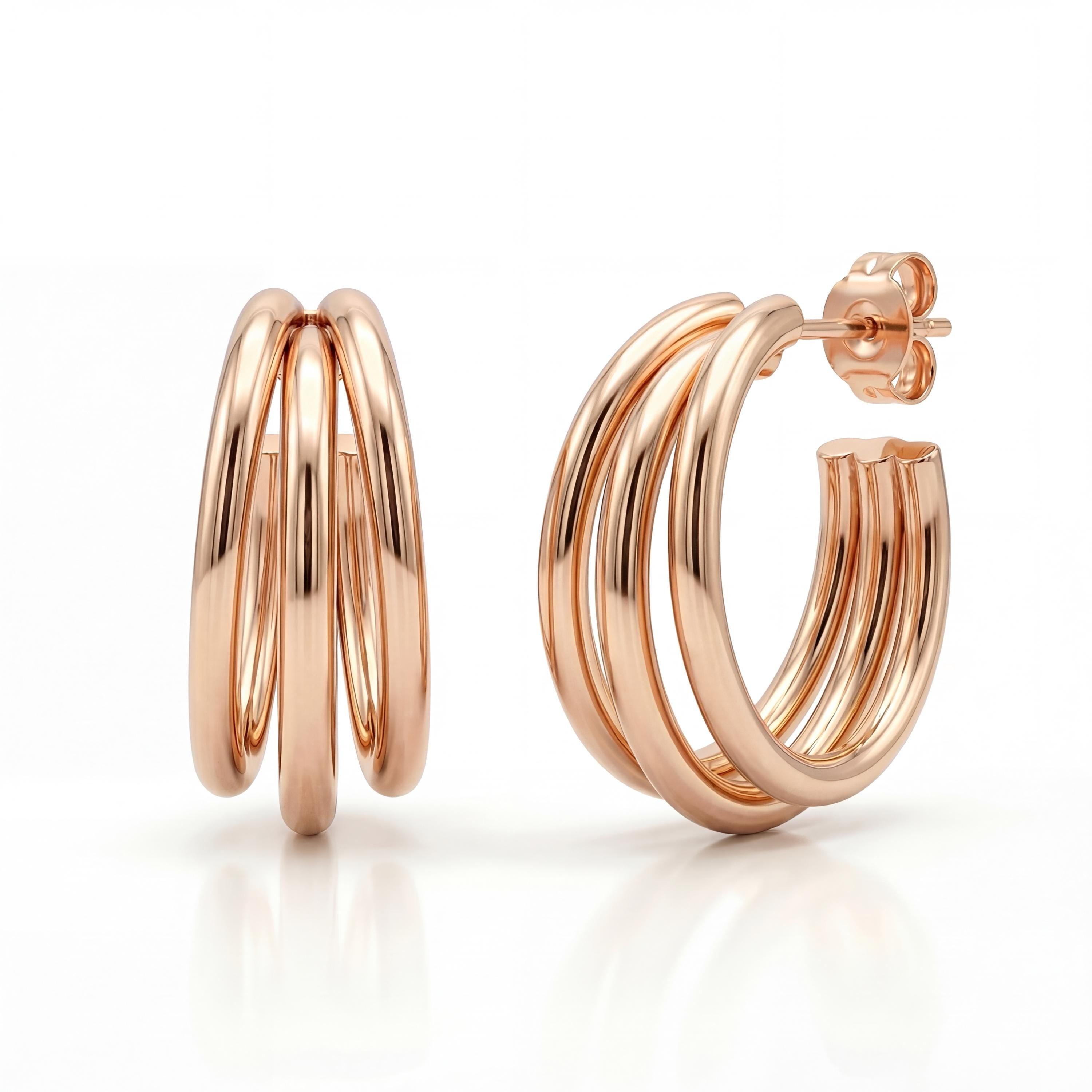 14K gold triple hoop earrings, close-up detail