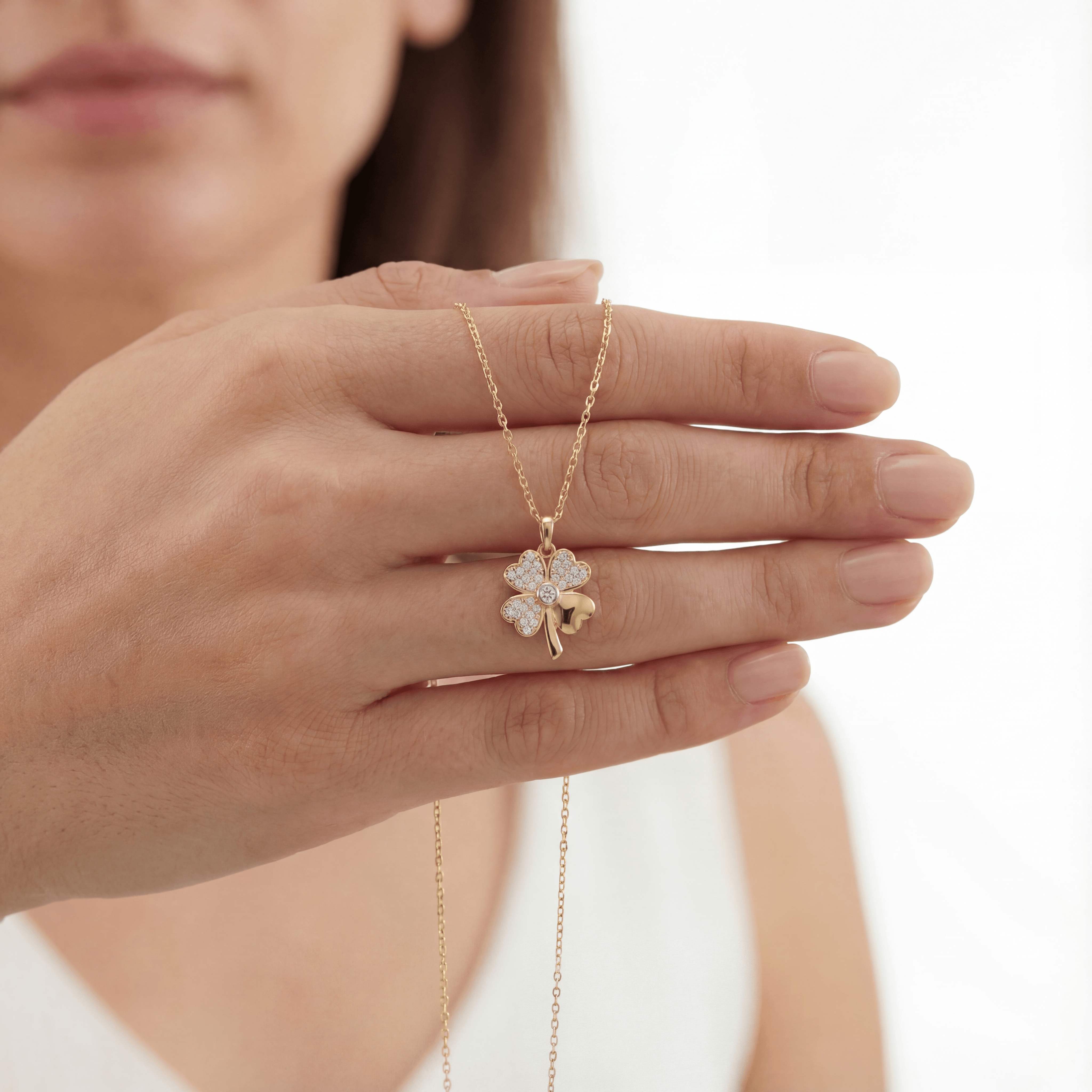 14K solid gold four leaf clover pendant necklace, close-up detail