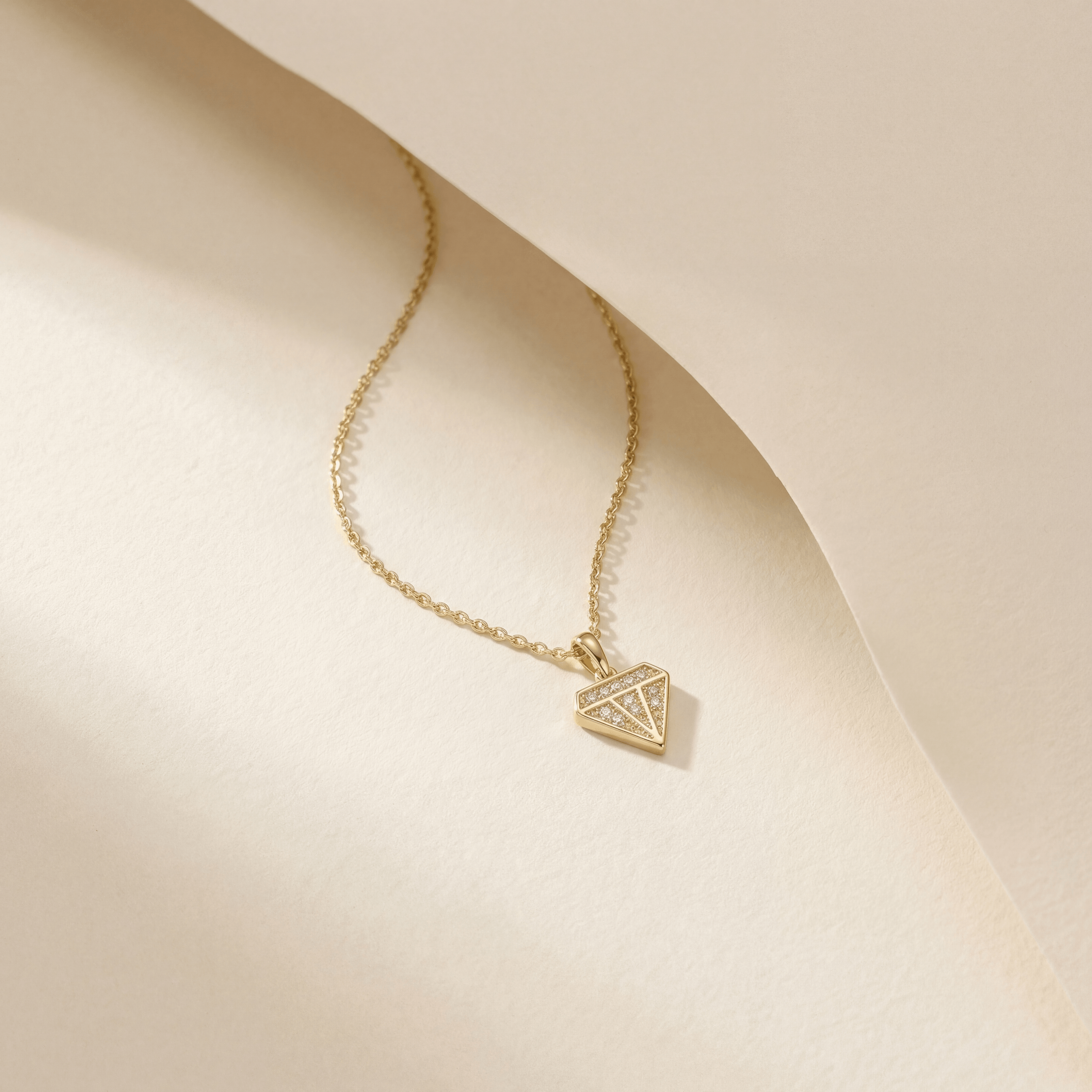 14K solid gold diamond silhouette pendant necklace, close-up detail