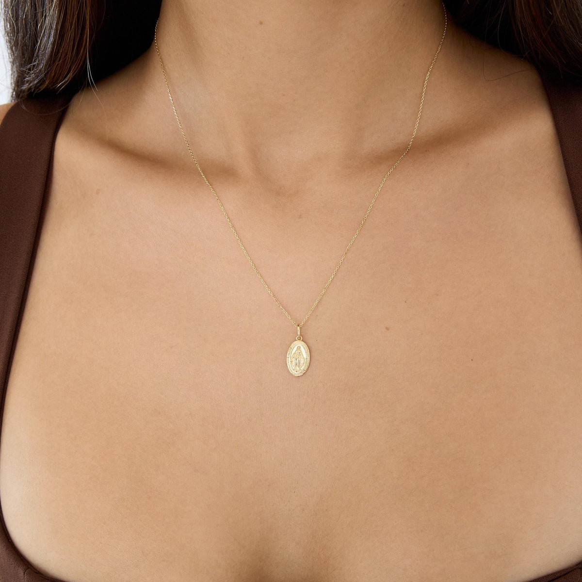 14K gold miraculous medal necklace, styled view