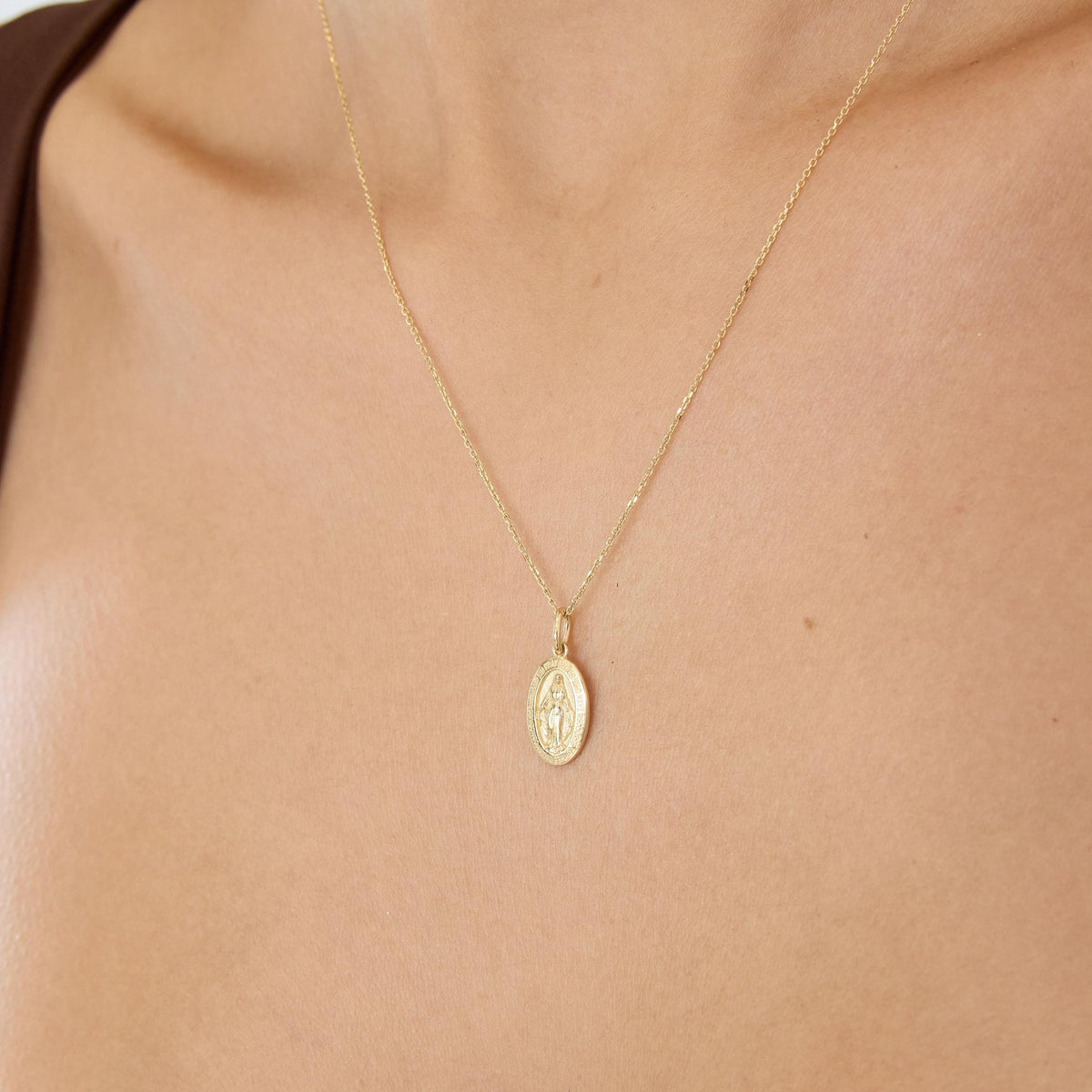 14K gold miraculous medal necklace, styled view