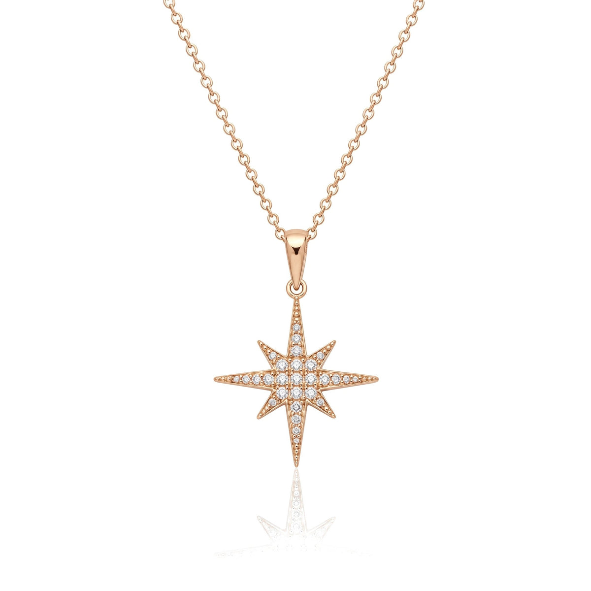 14K rose gold North Star necklace, eight-point star pendant paved with clear stones, on white