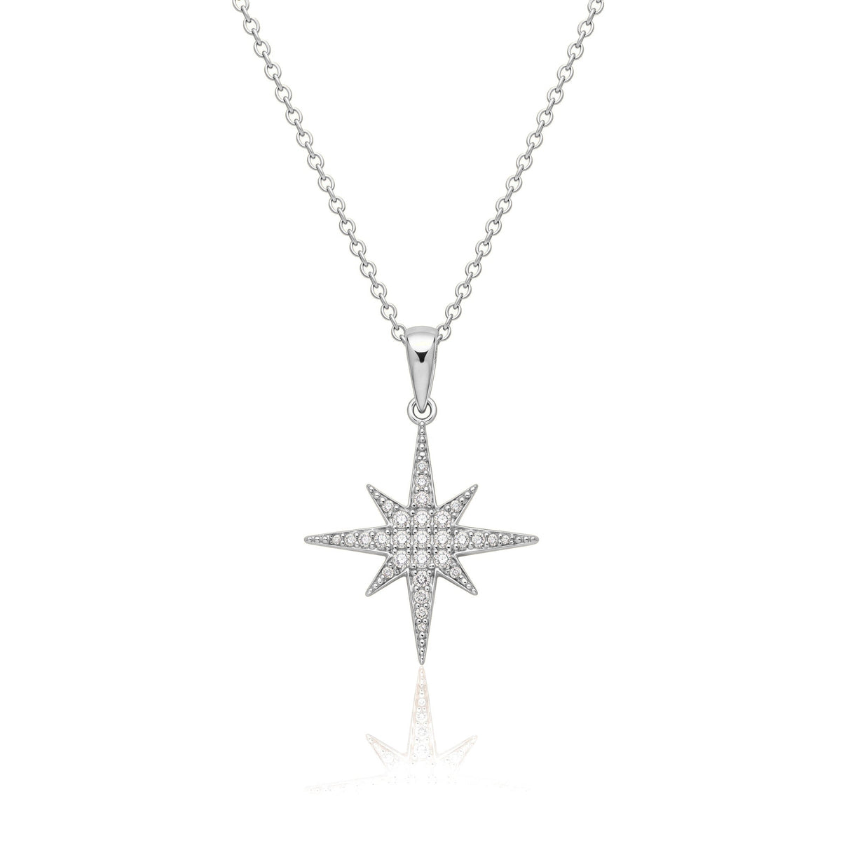 14K white gold North Star necklace, eight-point star pendant paved with clear stones, on white