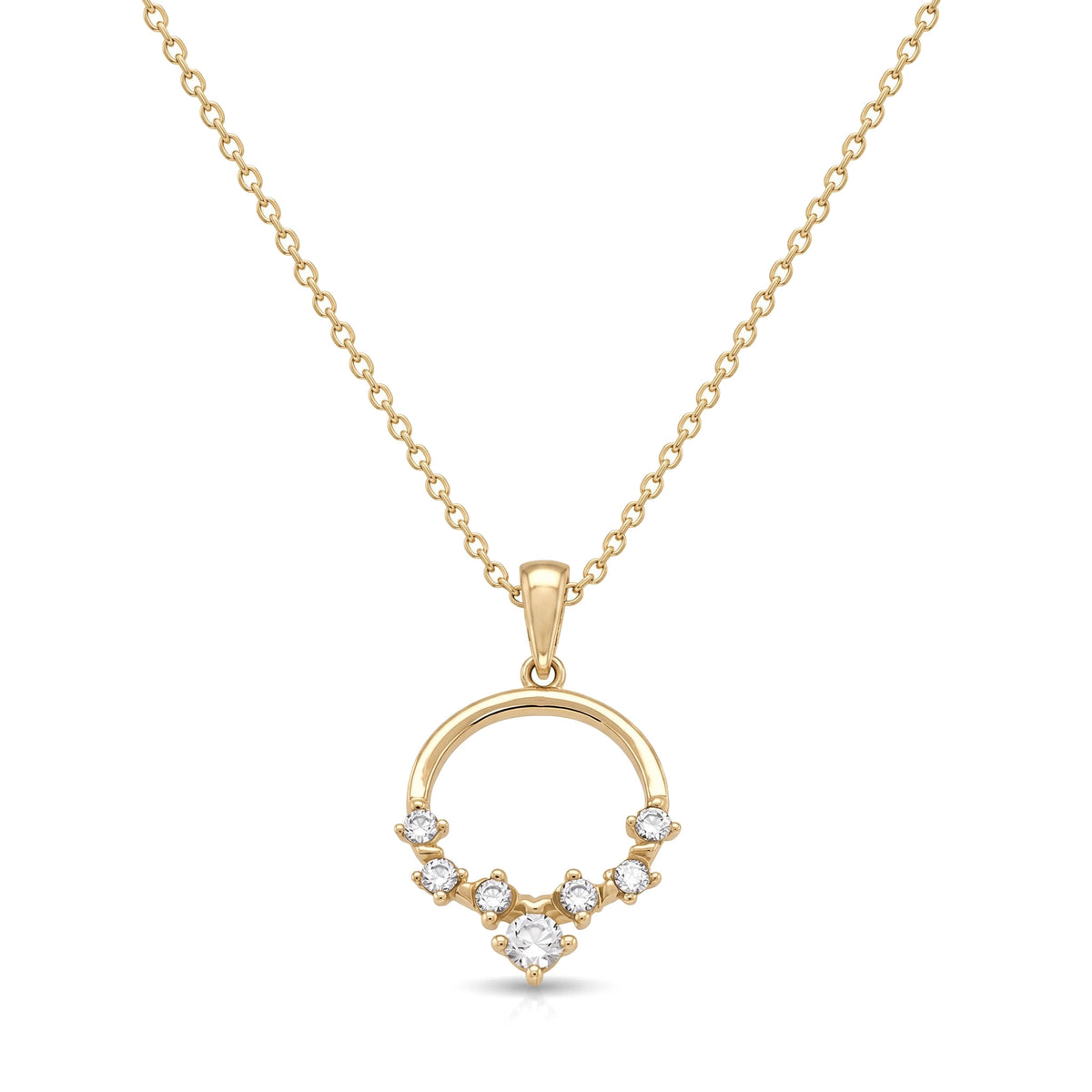 14K yellow gold open circle necklace, ring pendant with graduated clear stones along the lower half, on white