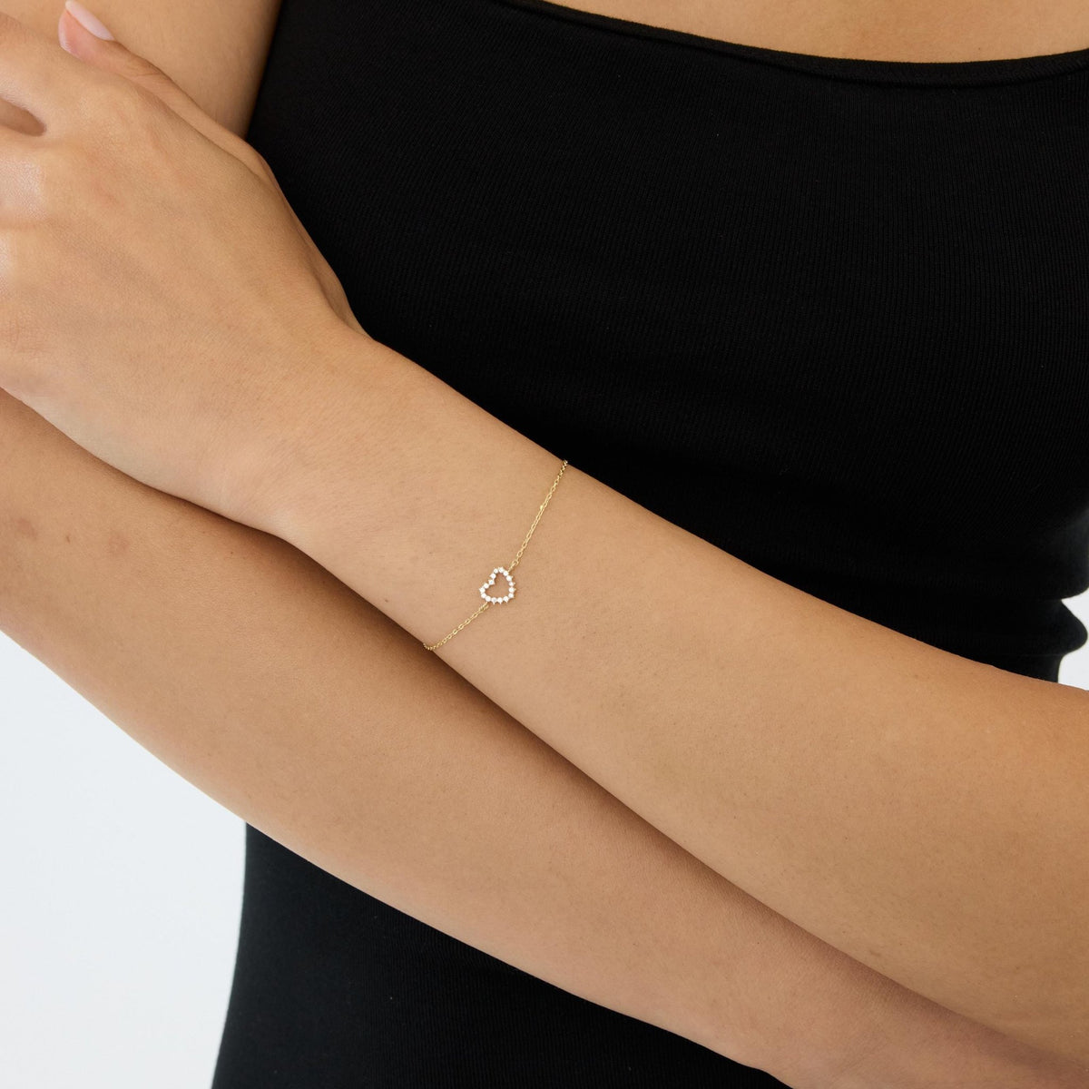 14K gold open heart bracelet, styled view