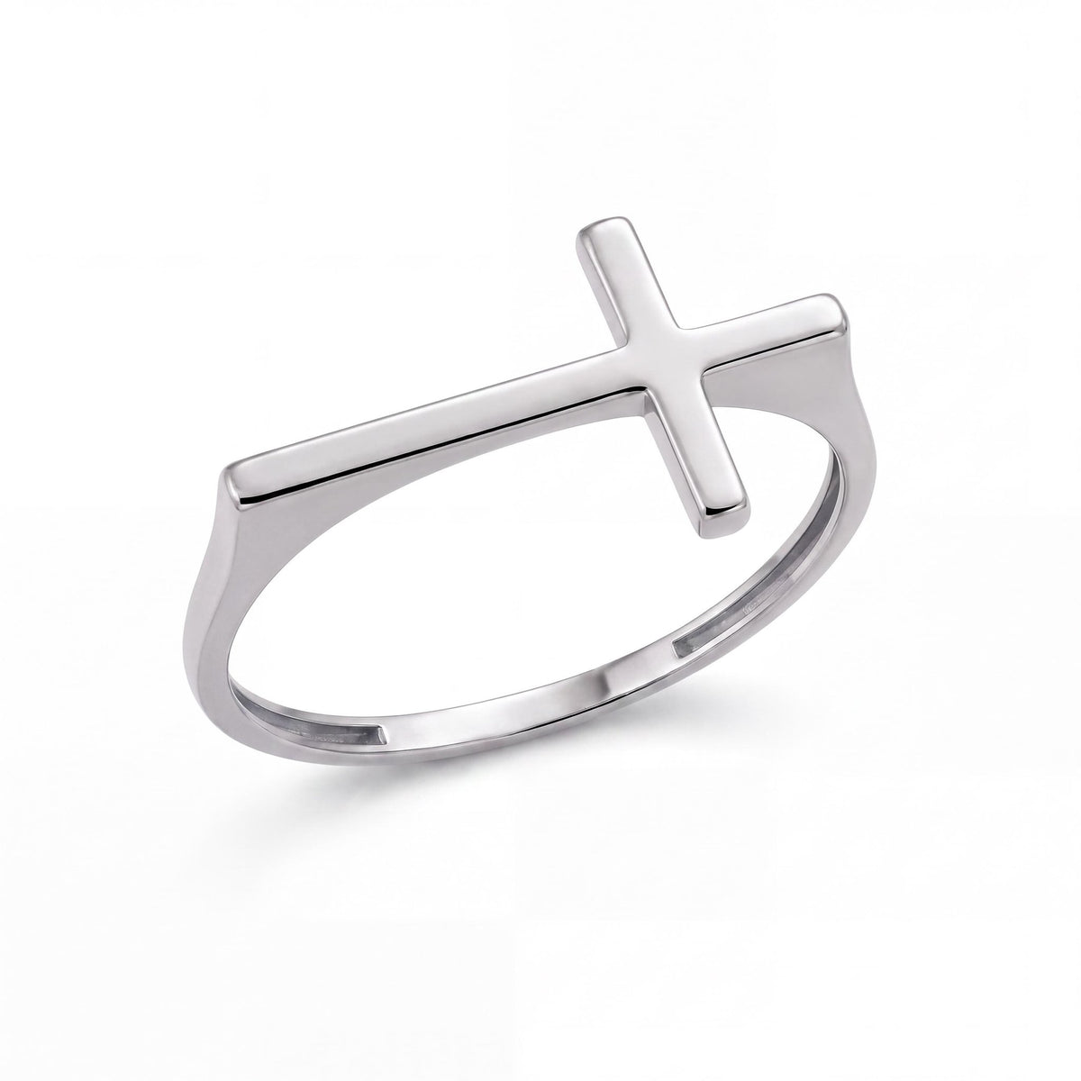 14K white gold sideways cross ring flat lay on plain white background