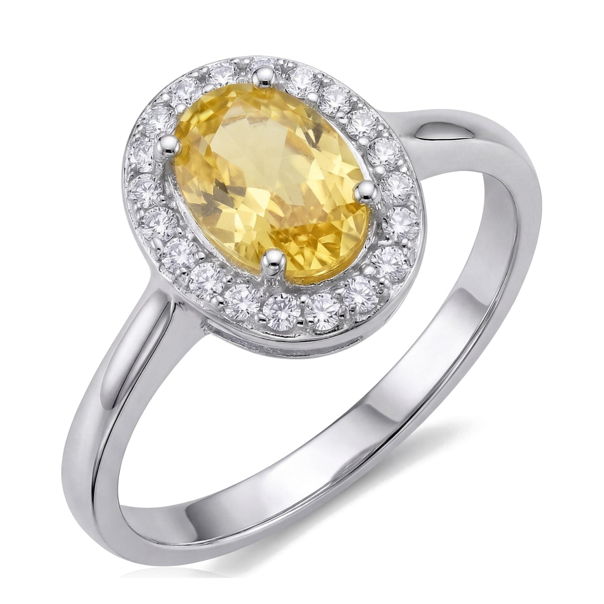 14K white gold simulated citrine ring, oval yellow stone in a halo of small clear stones, angled on white