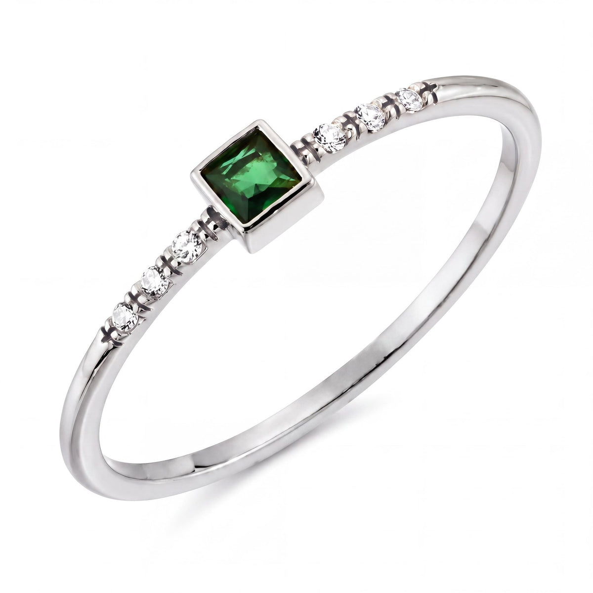 14K white gold square simulated emerald ring with cubic zirconia shoulders on a thin band, on white