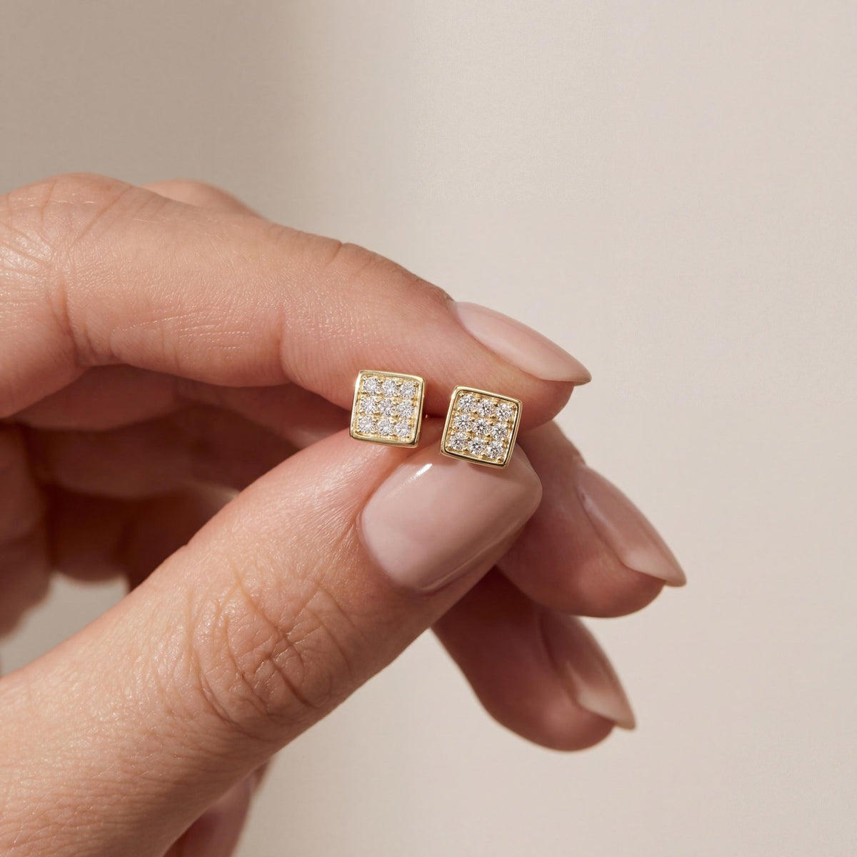 14K gold square stud earrings, styled view