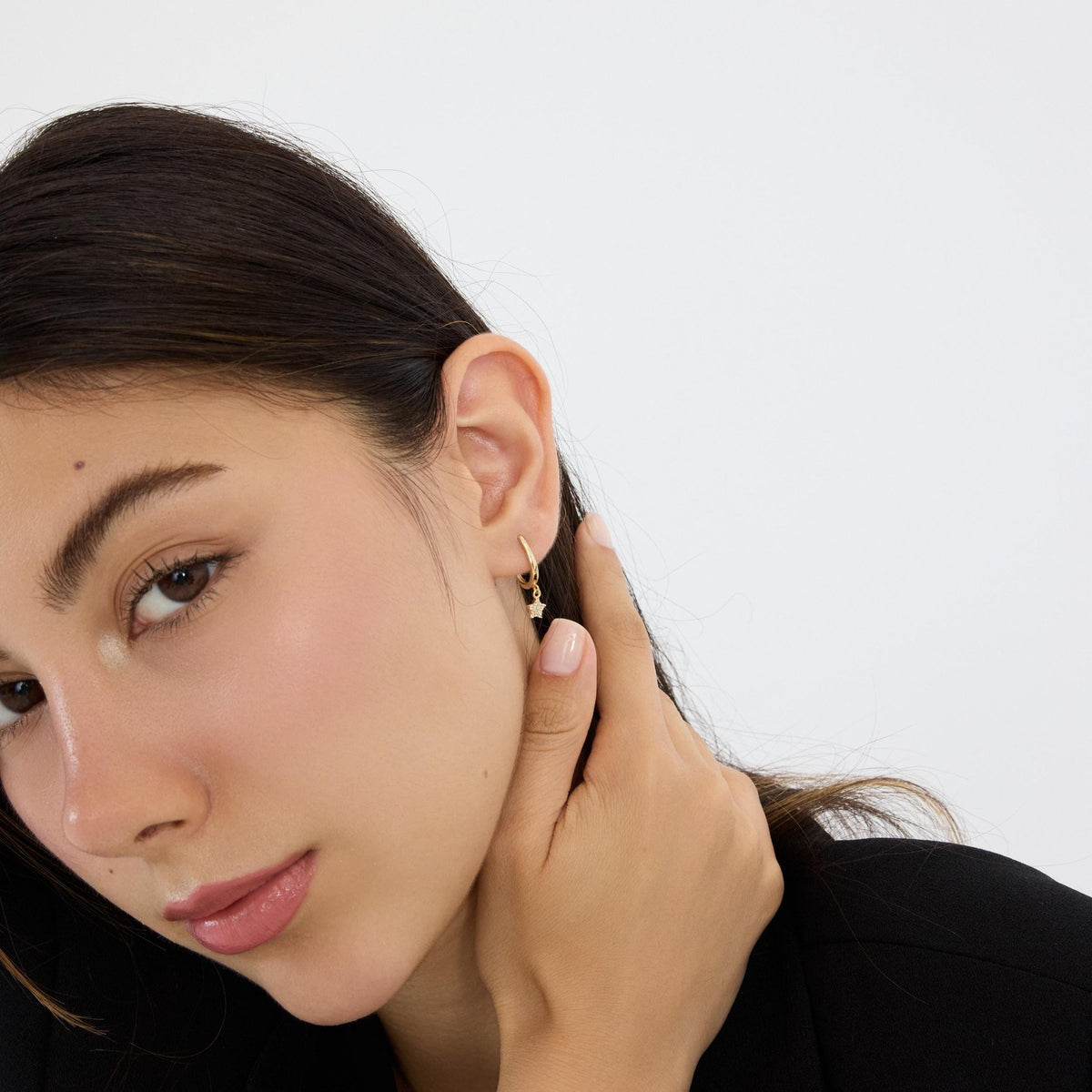 14K gold star hoop earrings, styled view