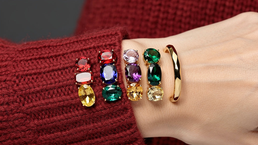 Colorful cut gemstones beside gold rings, a list of gemstones by color
