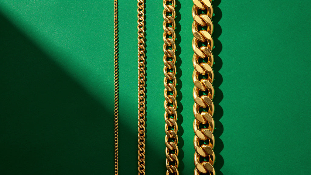 Gold chains in different thicknesses shown side by side