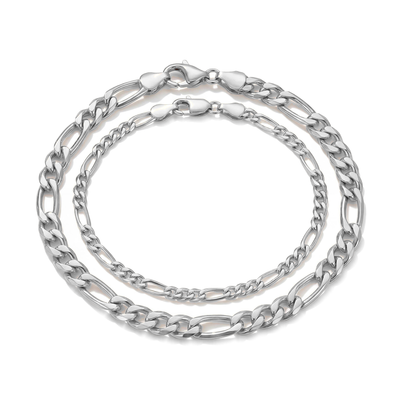 14K white gold figaro chain bracelets in two widths, nested with lobster clasps on white