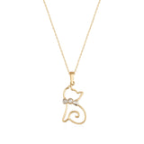 14K gold cat outline pendant necklace with bow and cubic zirconia accent on white background