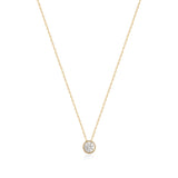 14K gold chain necklace with solitaire round cubic zirconia pendant on white background
