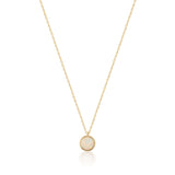 14K gold necklace with round opal-look pendant on a plain white background