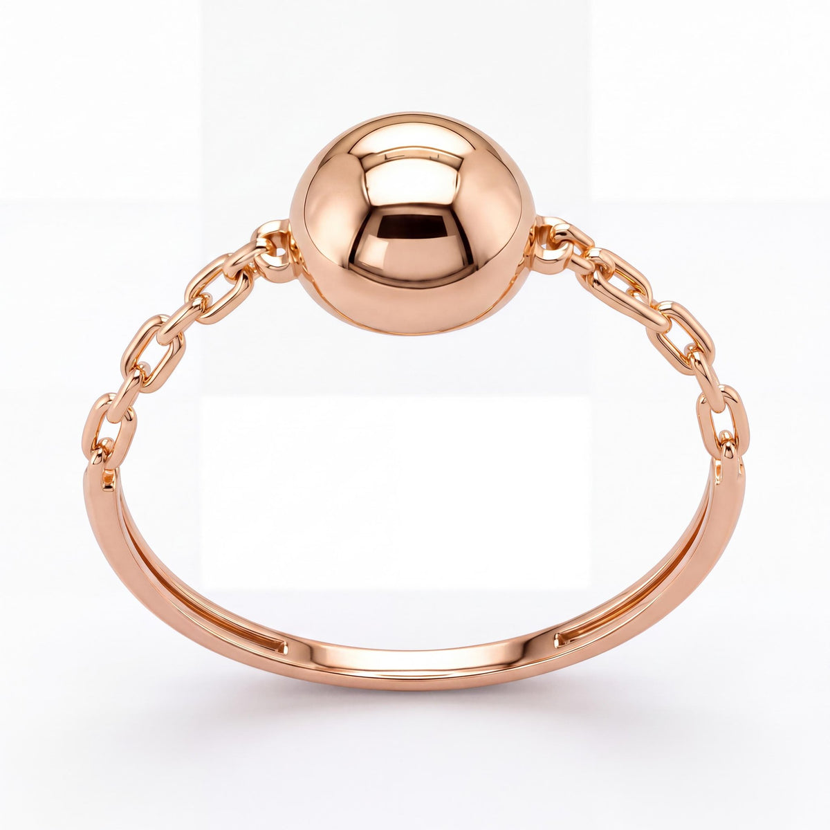 14K rose gold ball ring, polished sphere held by chain links on a slim band, front view