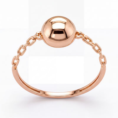 14K rose gold ball ring, polished sphere held by chain links on a slim band, front view