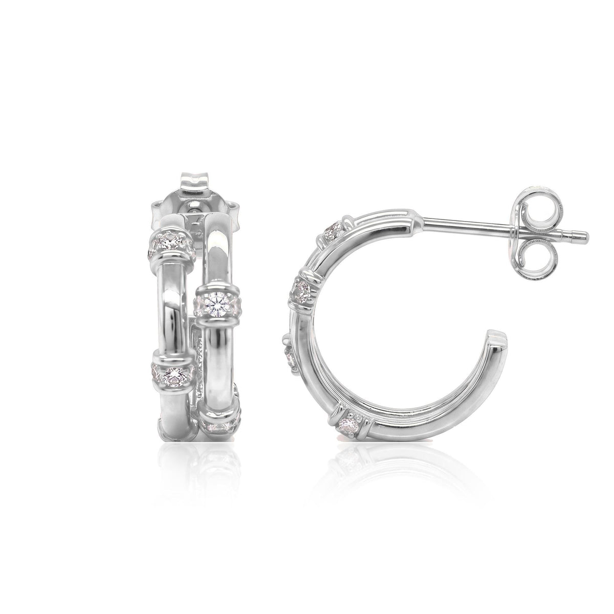 Pair of 14K white gold bamboo hoop earrings with round cubic zirconia, front and side view on white