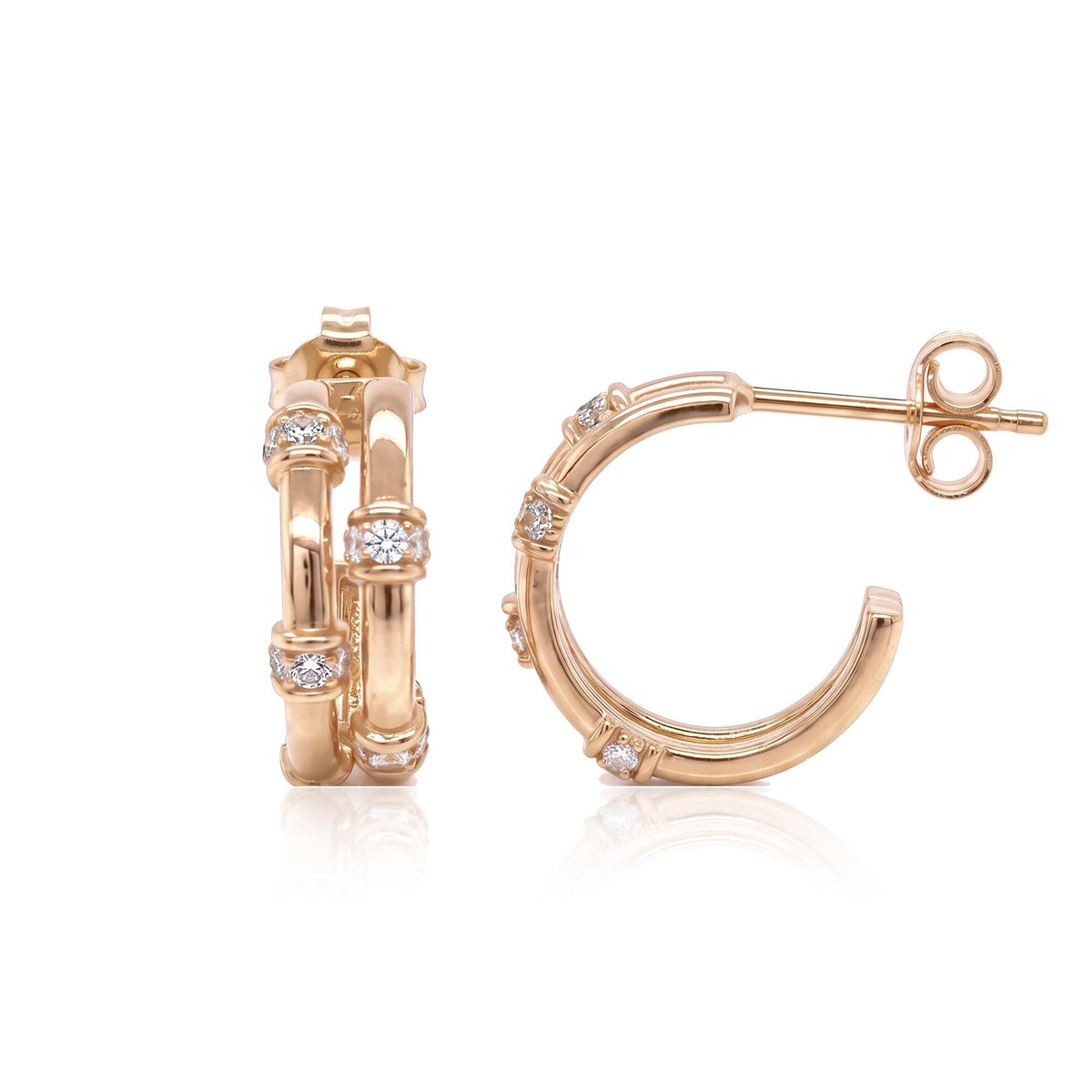 Pair of 14K rose gold bamboo hoop earrings with round cubic zirconia, front and side view on white