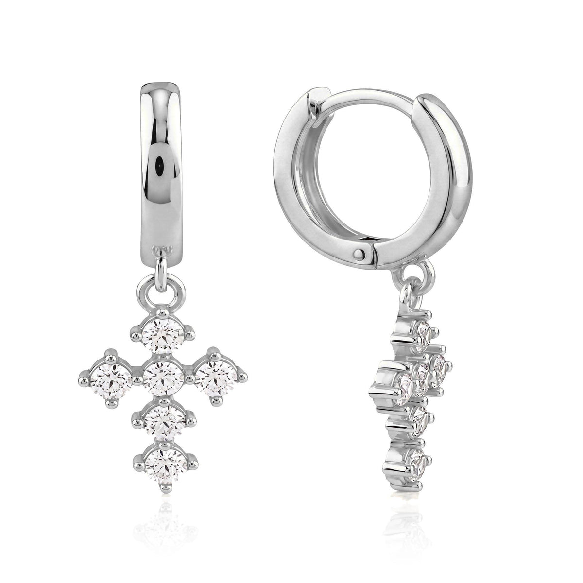 14K white gold cross huggie earrings with round cubic zirconia, front and side view on white