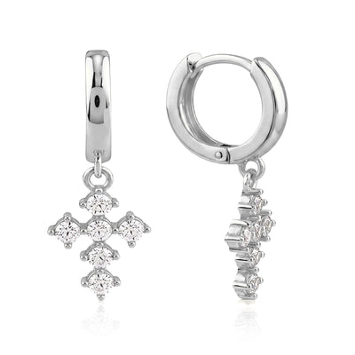 14K white gold cross huggie earrings with round cubic zirconia, front and side view on white