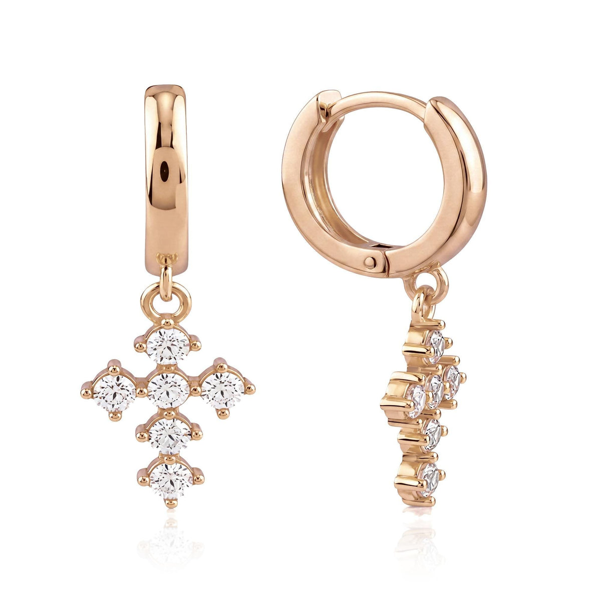 14K rose gold cross huggie earrings with round cubic zirconia, front and side view on white