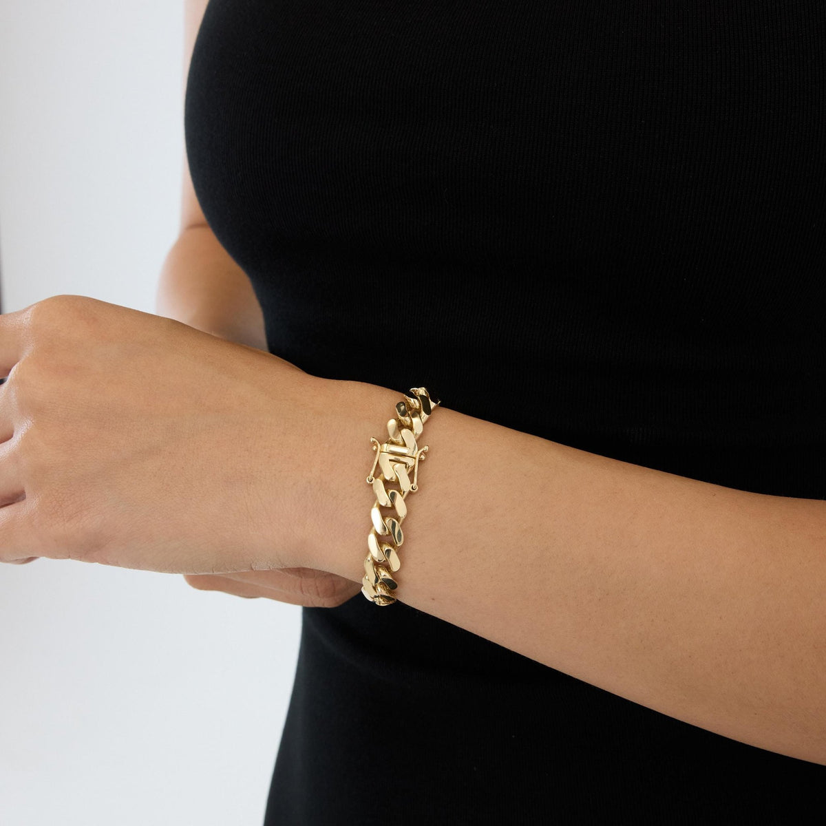 14K gold cuban link bracelet chain necklace, styled view