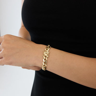 14K gold cuban link bracelet chain necklace, styled view