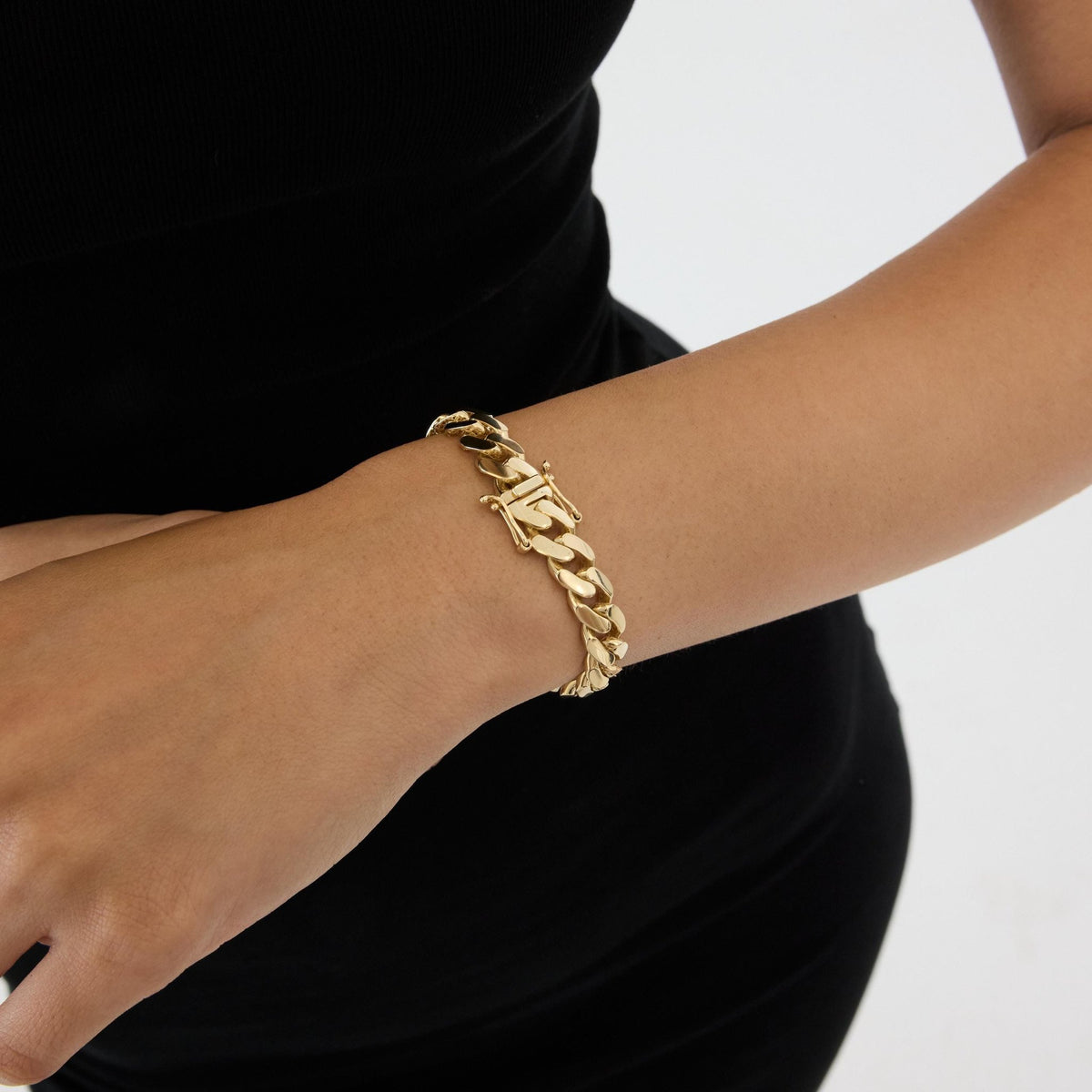 14K gold cuban link bracelet chain necklace, styled view