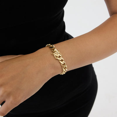 14K gold cuban link bracelet chain necklace, styled view