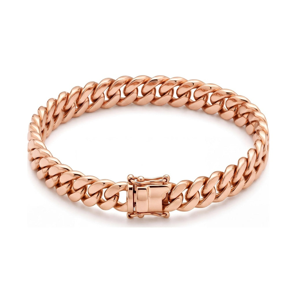 14K rose gold Cuban link bracelet, thick curb links closed with a box clasp, on white