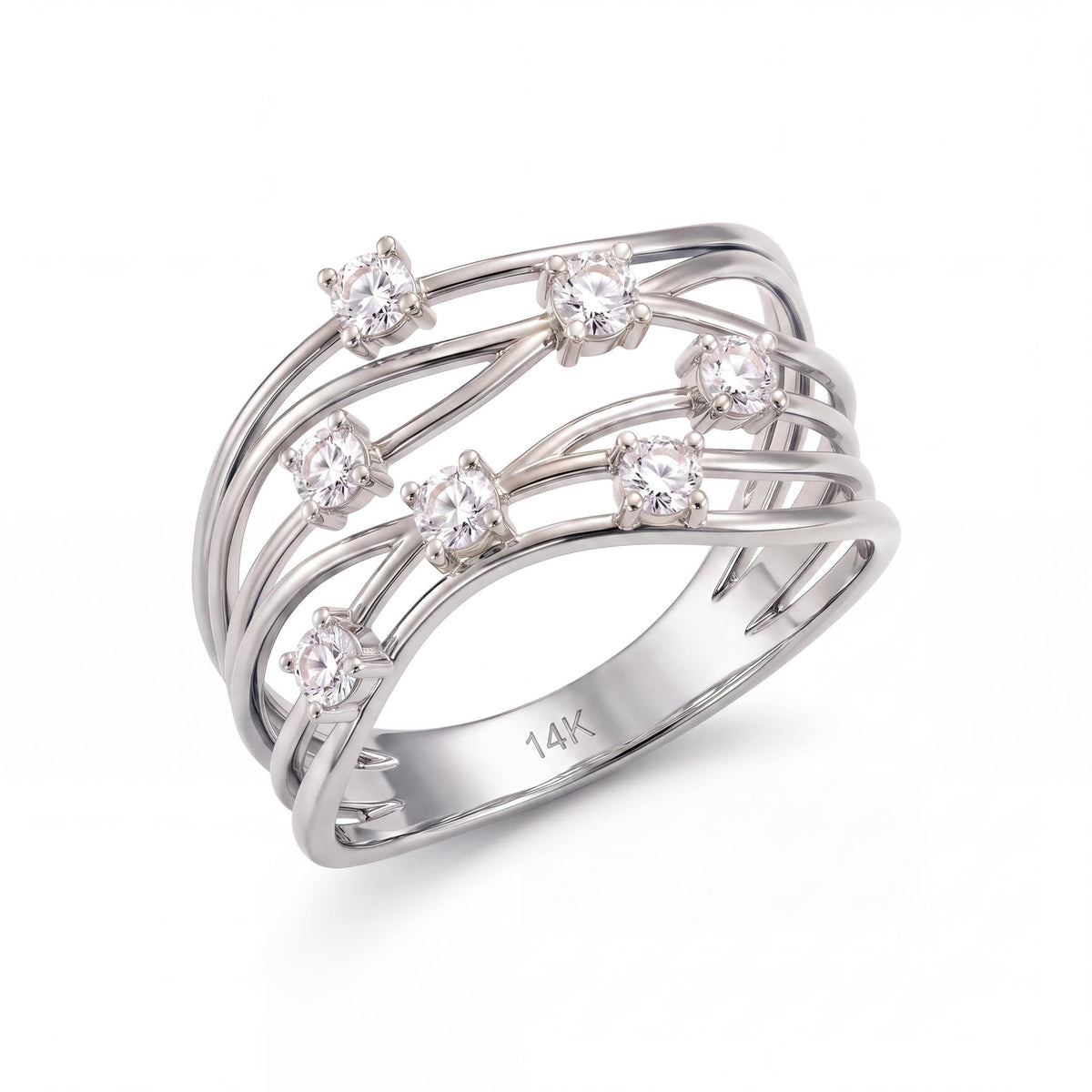 14K white gold CZ statement ring, wide openwork band of wavy strands with seven prong-set stones