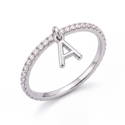 14K white gold dangle initial ring, thin clear stone pavé band with a hanging letter A charm, on white